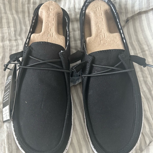 Hey Dude Shoes - Women’s black and white hey dude size 9